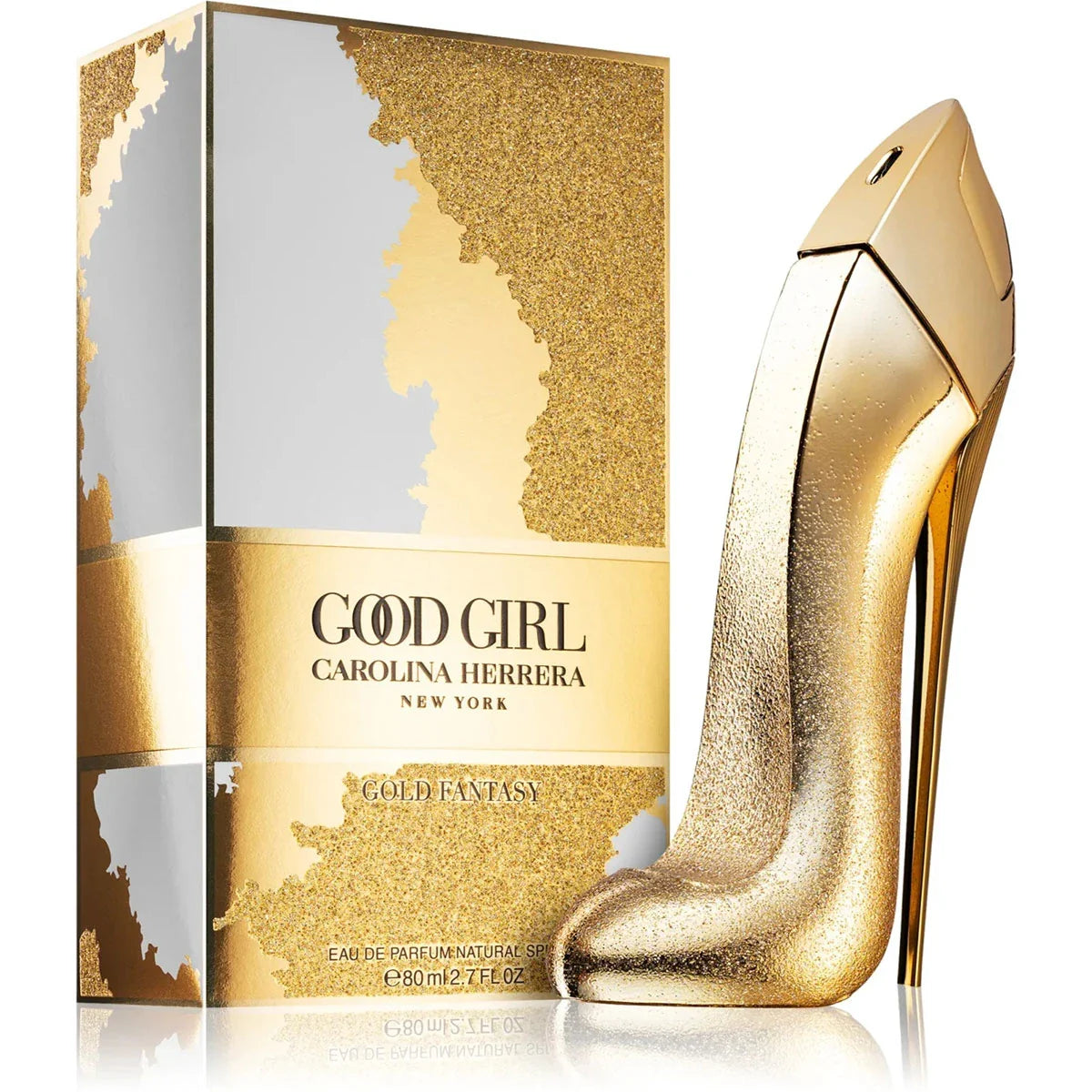 Gold high-heeled shoe and 'Good Girl' Carolina Herrera perfume box on a white background