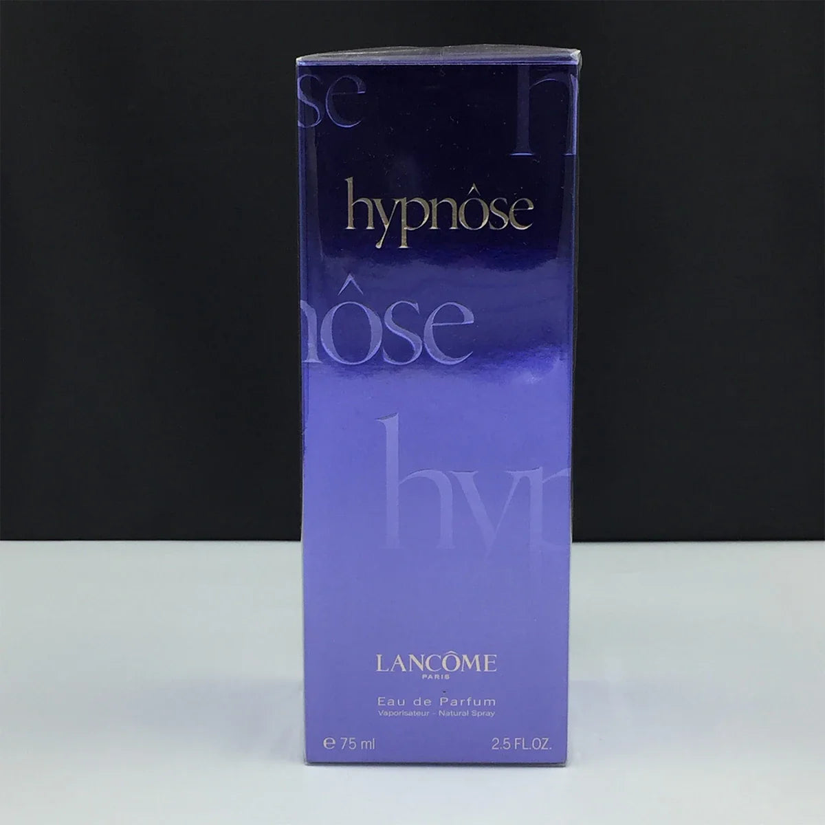 Lancome Hypnose perfume packaging on a black and white background