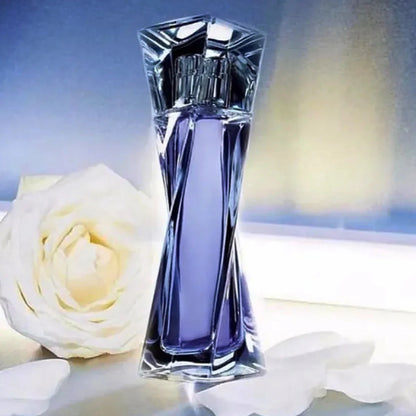 Perfume bottle with a white rose on a gradient background