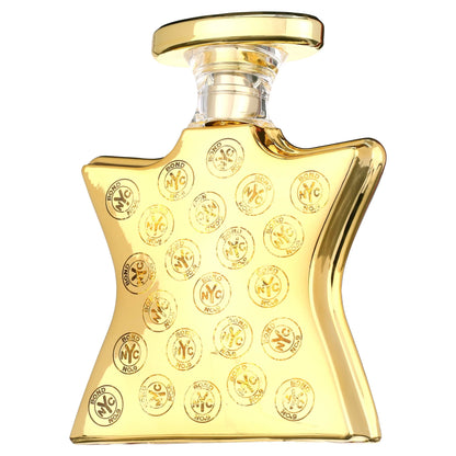 Gold perfume bottle with decorative design on a white background