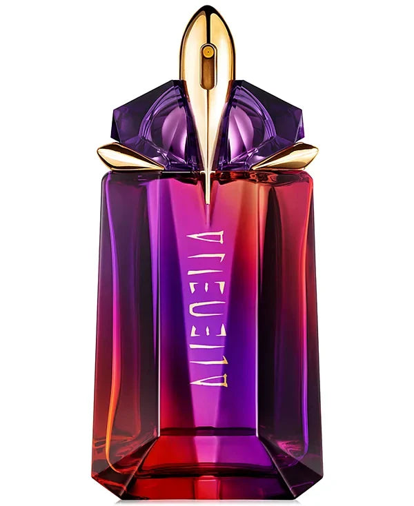 Viktor & Rolf Flower by Nina perfume bottle with purple and red gradient on a white background