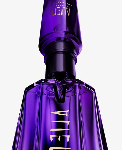 Purple bottle with gold text on a white background