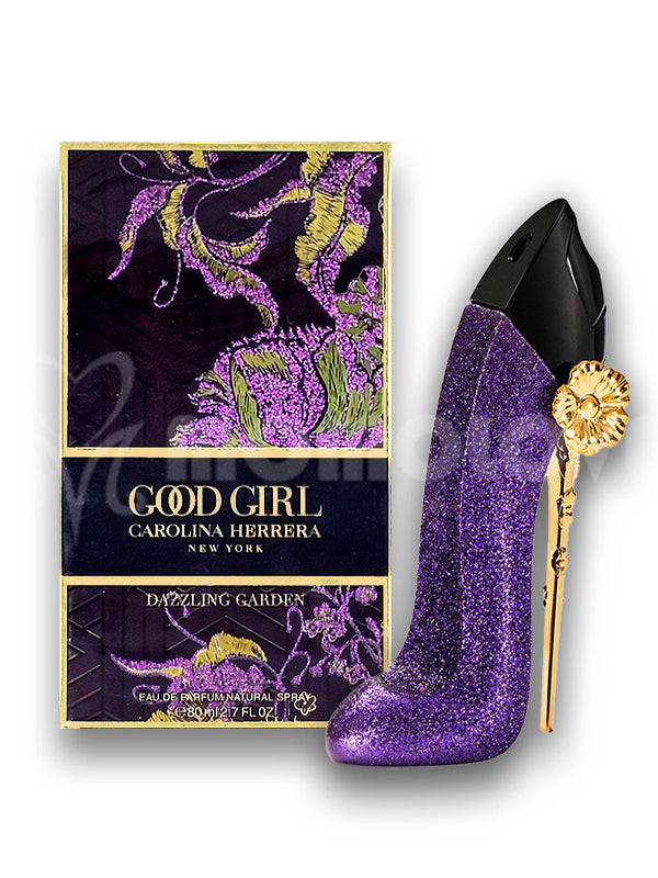 Purple glitter high heel shoe with gold heel and Carolina Herrera 'Good Girl' perfume box